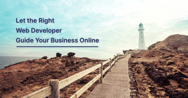 Lighthouse guiding a path along a rocky coastline, symbolizing choosing a web developer to lead small businesses toward online success.
